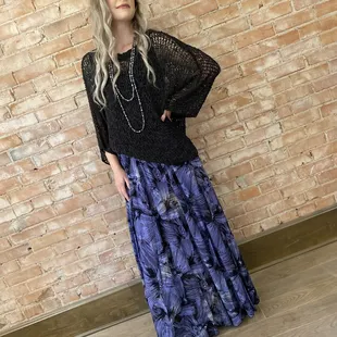 These tiered wide palazzo pants have a fold-over stretch waist. Comfy and fun for summer or at the beach!