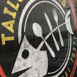 a sign for tails and bones