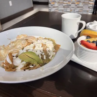 Chilaquiles, fresh fruit, coffee