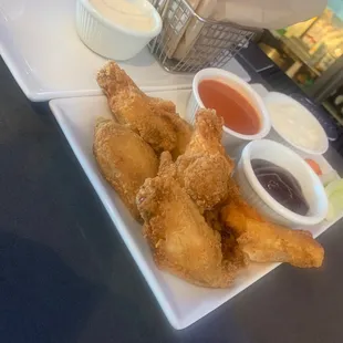 Happy Hour Wings (6), naked and crispy, sauce on side, $5!