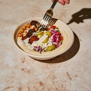 a plate of food with a fork