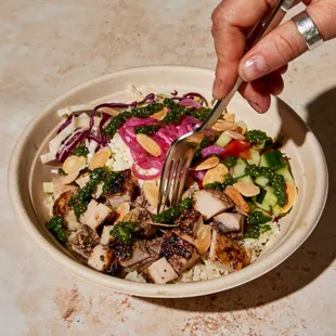 a person eating a salad