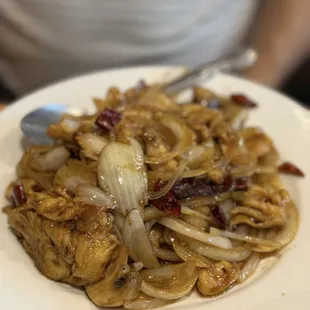 Chicken Mongolian. We didn&apos;t order this. It was brought to us by accident, but the few bites we had were very, very good.