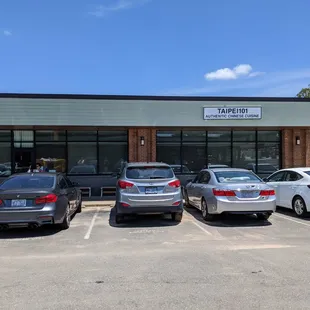 Outside. Storefront. Free parking. If you can&apos;t find parking in this lot, there is free street parking too (to the left from this vantage).