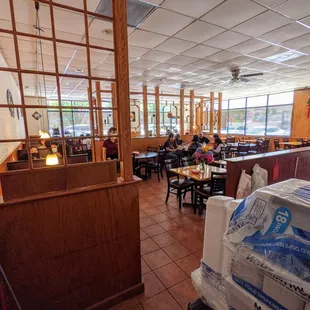 Inside. Dining room. View from restroom hallway.