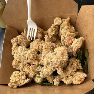 Popcorn Chicken (the amount of chicken is smaller than it appears in this picture- the folded down flap creates empty space in the box)