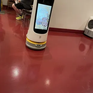 Robotic server delivering a meal