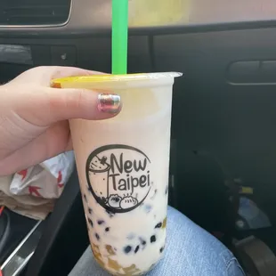 Mango milk Tea, Tapioca pearls, mango and coconut jellies  10/10 it was heavenly