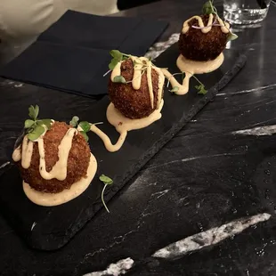 Cheese ball appetizer. Slight spice to it. So tasty def try these!