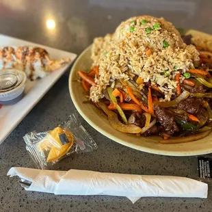 a plate of rice and vegetables