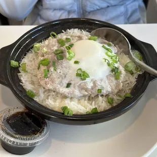 Egg and meat patty clay pot rice. (On the outdoor menu, not on printed menu)