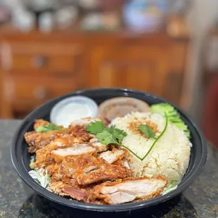 Fried Hainan Chicken Rice- Light battered fried chicken with Garlic ginger rice and Sweet chili sauce