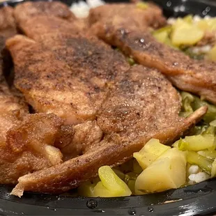 R1. Pork Chop Over Rice ($5.75)