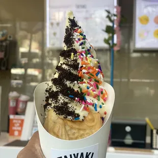 Nutella filing, vanilla soft serve, crushed oreos and sprinkles topping