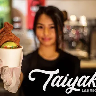 a woman holding a bowl of food