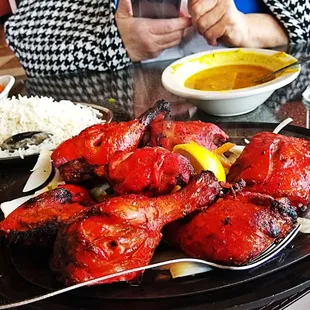 a plate of chicken and rice