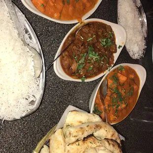 Butter chicken and something else with lamb (forgot the name) and a basket of garlic naan