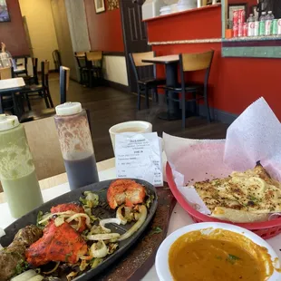Tandoori Mix Grill (19.99) with garlic naan, gravy (masala) Chai (1.99)