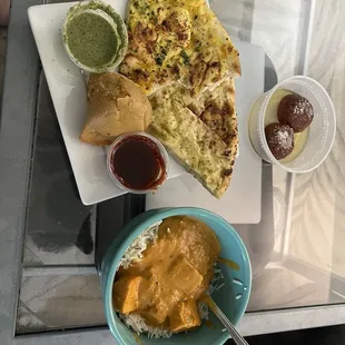 Garlic naan, basil naan, Samosa, chicken tikka masala, house dessert