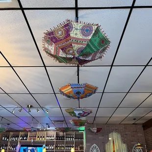 Cute upside down umbrellas as ceiling decor