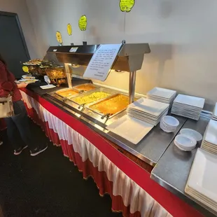 a buffet with a variety of food items