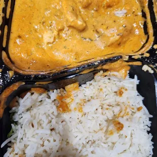 Chicken Tikka masala. Was more bright yellow in person.