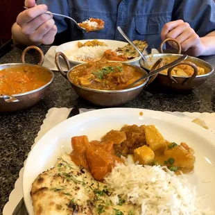 Chicken tikka masala, chicken vindaloo, navratan korma, Garlic Naan