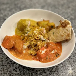 Takeout (from bottom right going clockwise): Paneer Makhani, Chicken Tikka Masala, Malai Kofta, Jeera Aloo &amp; Cheese Garlic naan.