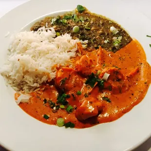 a plate of food with rice and meat