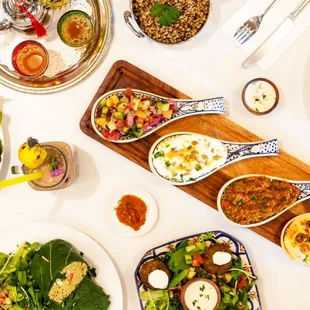 Mezze platter, falafel, Mint tea, Bastilla, Collard green burrito...