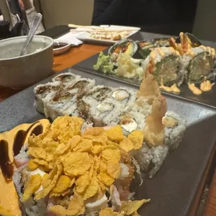 Chicken sushi, eel and cucumber ( best roll), Philly role with shrimp,...