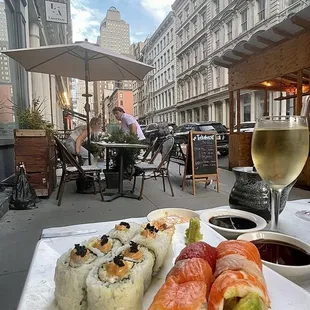 Rainbow and Superman Roll with a glass Sauvignon Blanc