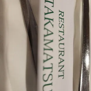 a fork and knife on a napkin