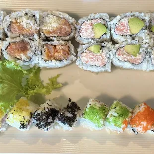Various rolls - spicy tuna, California, and King Crab