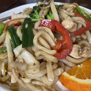 a plate of noodles and vegetables