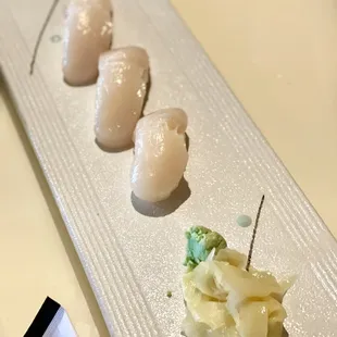 three pieces of sushi