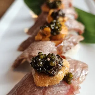 Kobe beef sushi with caviar, uni, and black truffle - a symphony of OMG flavors and textures in every bite.