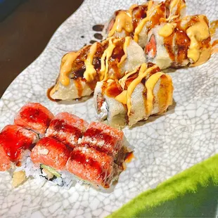 a variety of sushi on a plate