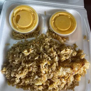 rice and sauces in a styrofoam container
