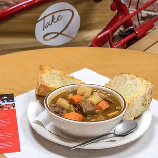 Try a hearty bowl of stew with a side of toasted french bread!