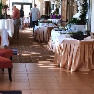 a restaurant with tables and chairs