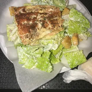 Blackened salmon over ceasar salad.
