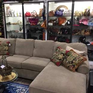 Gently used flex steel couch. Great selection of women hand bags. What a awesome store.