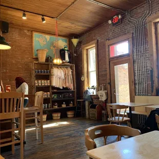 a restaurant with tables and chairs