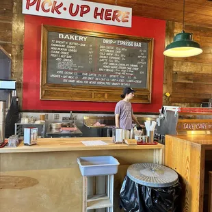 a man standing at a counter