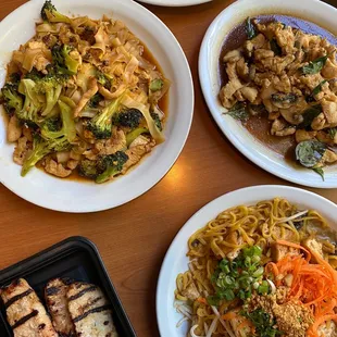 four plates of food on a table