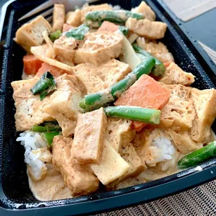 Tofu Curry (comes with rice) - $9.00. Really good! Lots of tofu.