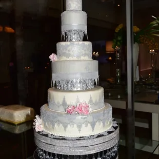 Silver lace wedding cake.