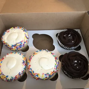 Vanilla cupcakes and black out cupcakes