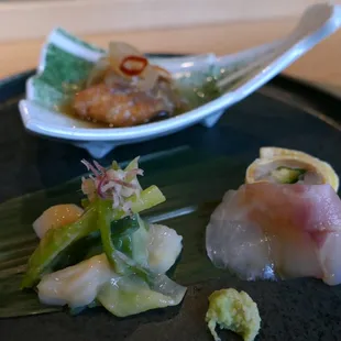 1. Deep fried fluke. Suzuki sashimi with jack fish wrapped in egg. Squid dipped in miso sauce topped with hanako flower